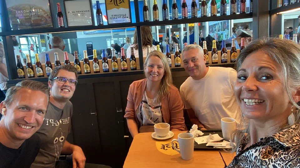 A group of people enjoying a coffee at Brussels Airport, just before leaving to Dreamforce