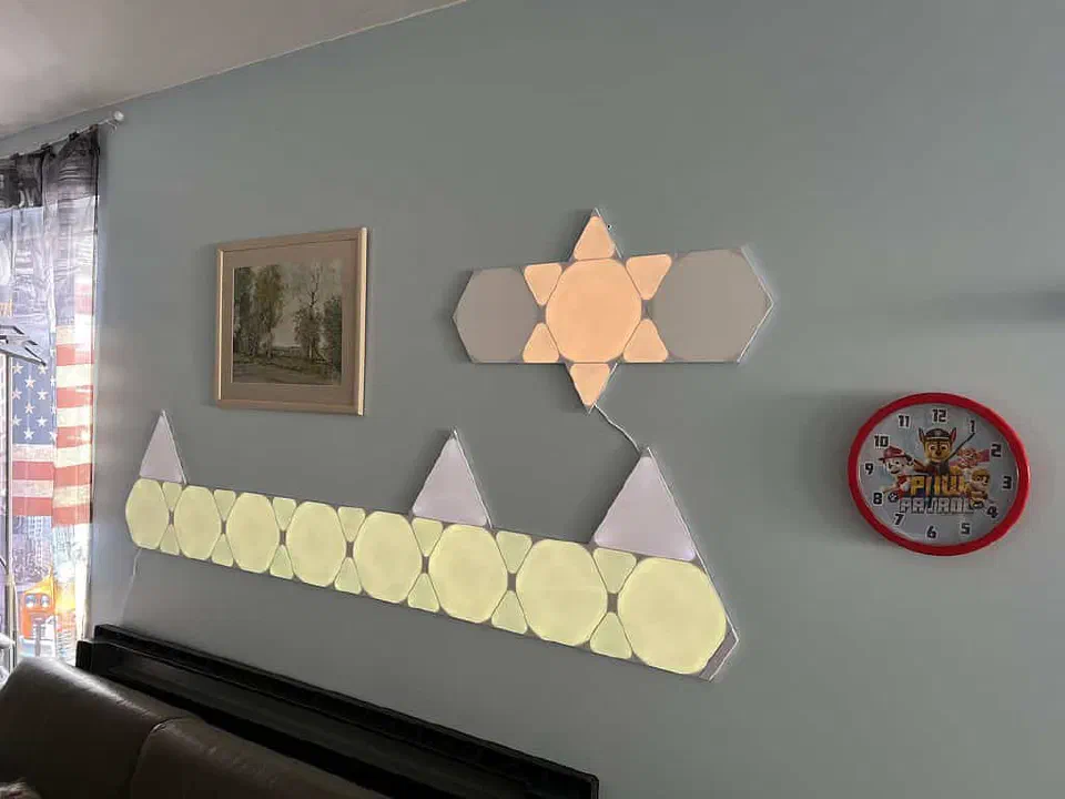 Nanoleaf wall panels configured to display the day's weather for the kids.